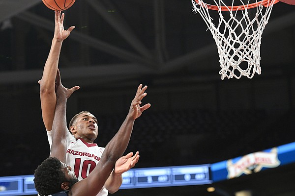 Arkansas' Daniel Gafford shoots over the top of Oral Roberts defender Chris Miller during a game Tuesday, Dec. 19, 2017, in Fayetteville. 