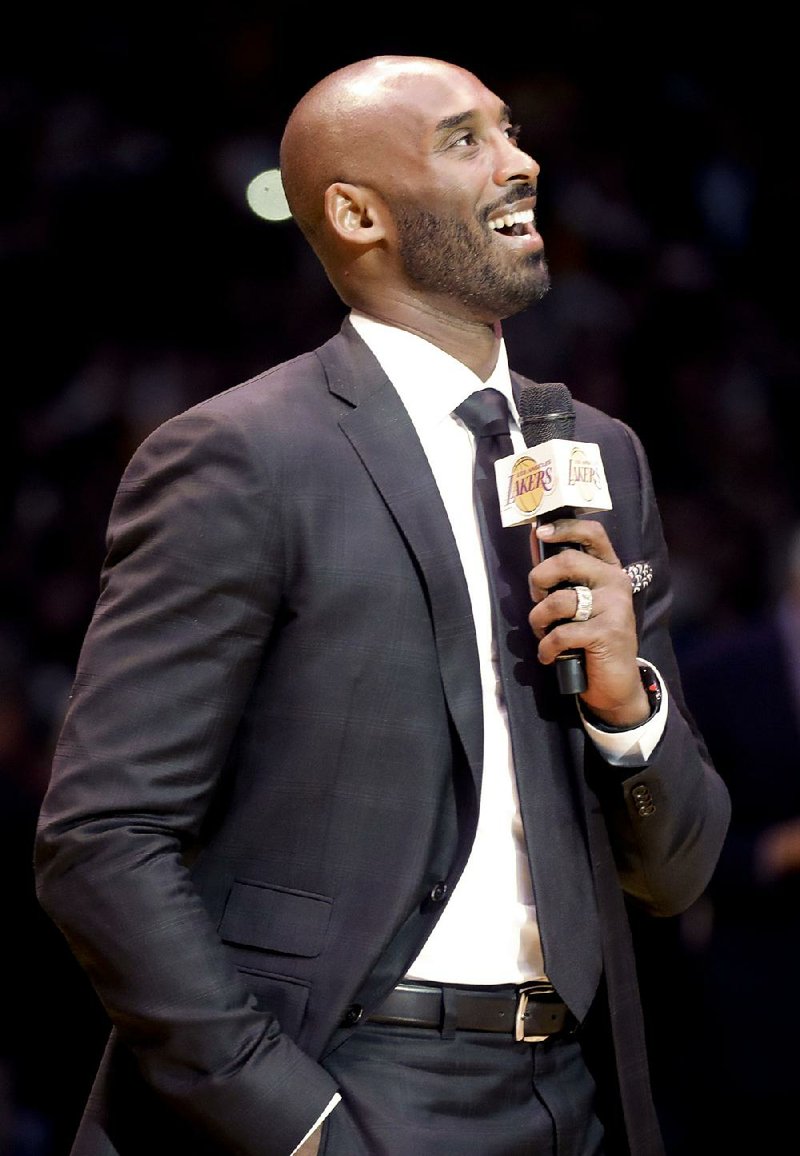 Former Los Angeles Lakers star Kobe Bryant said he didn’t have a preference about which number he liked better when his No. 8 and No. 24 jerseys were retired Monday night. 
