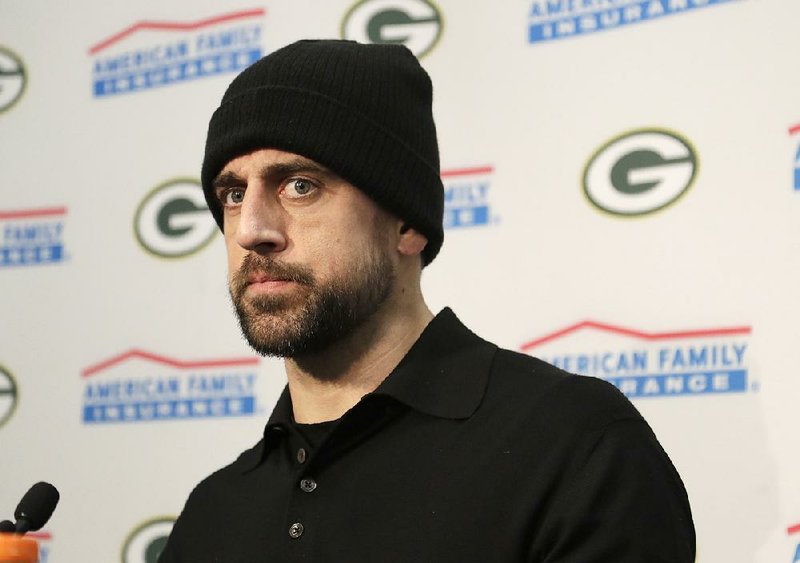 Green Bay Packers' Aaron Rodgers pauses as he speaks to the media after an NFL football game against the Carolina Panthers in Charlotte, N.C., Sunday, Dec. 17, 2017. 