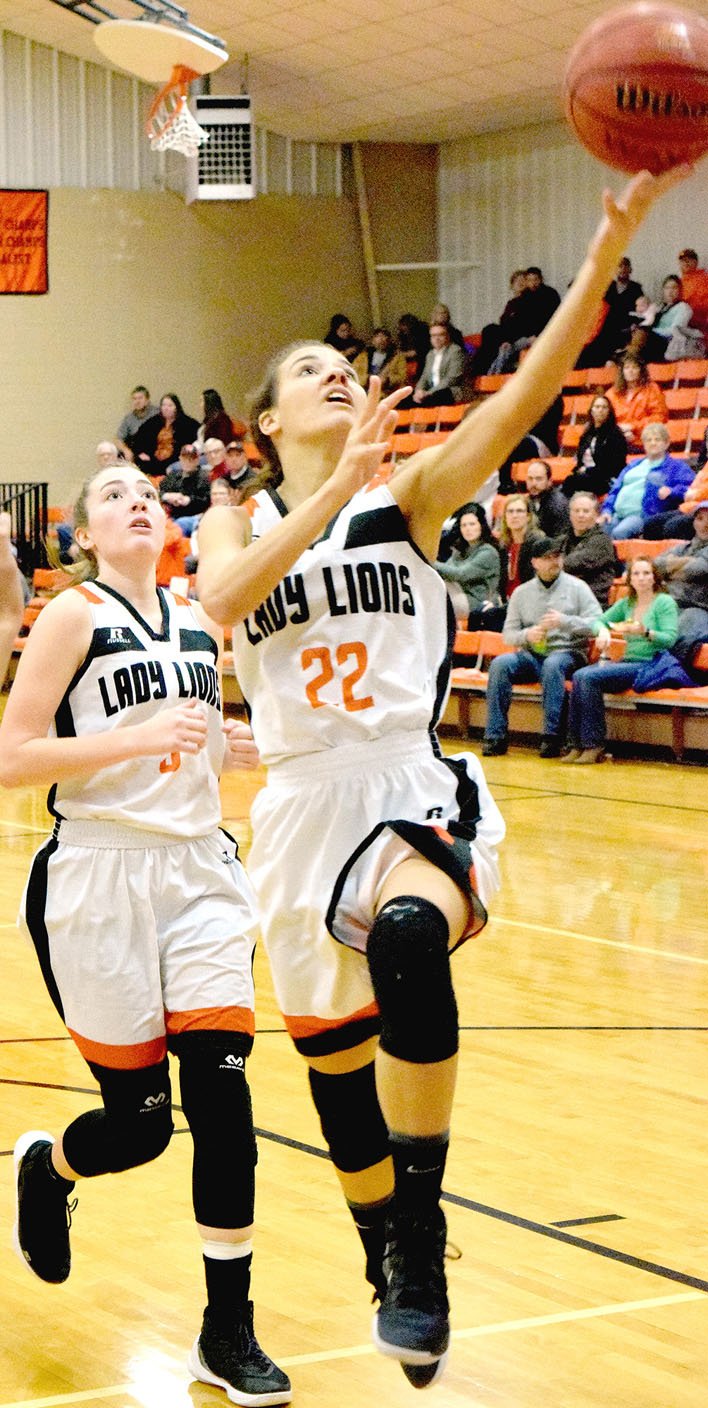 Westside Eagle Observer/MICHAEL ECKELS Gravette senior Tori Foster sails in for a layup. Gravette defeated Prairie Grove, 60-41, in girls' basketball action on Dec. 12.