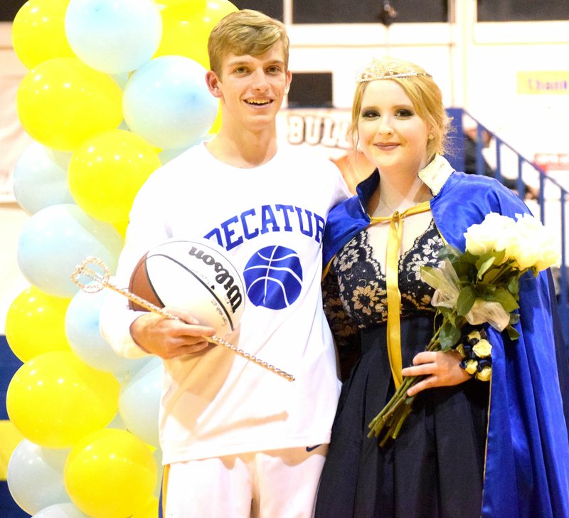 Westside Eagle Observer/MIKE ECKELS Taylor Haisman and Johnna Herron were named colors day king and queen during a ceremony between the junior and senior high boys' basketball contests at Peterson Gym in Decatur Dec. 15.