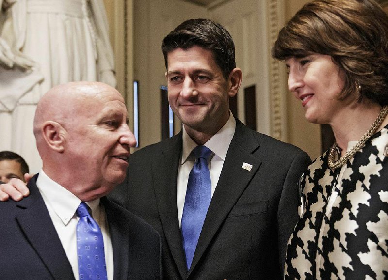 House Ways and Means Committee Chairman Kevin Brady (from left) joins House Speaker Paul Ryan and Rep. Cathy McMorris Rodgers, R-Wash., Tuesday after the House passed the tax bill.
