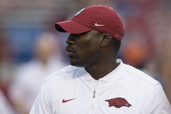Arkansas defensive line coach John Scott Jr. watches warmups prior to a game against Florida A&M on Thursday, Aug. 31, 2017, in Little Rock. 