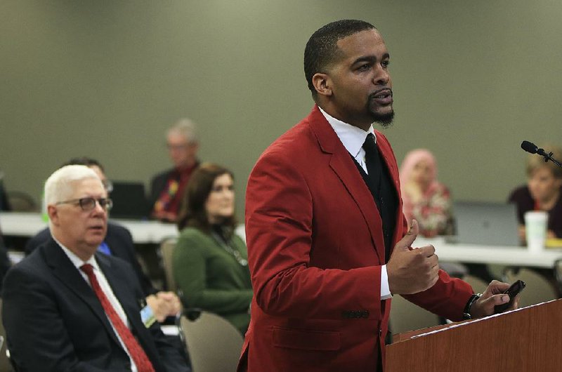 Dennis Felton, principal of Premier High School of Little Rock, speaks Thursday during a meeting of the state’s Charter Authorizing Panel. The school’s charter was up for renewal. 