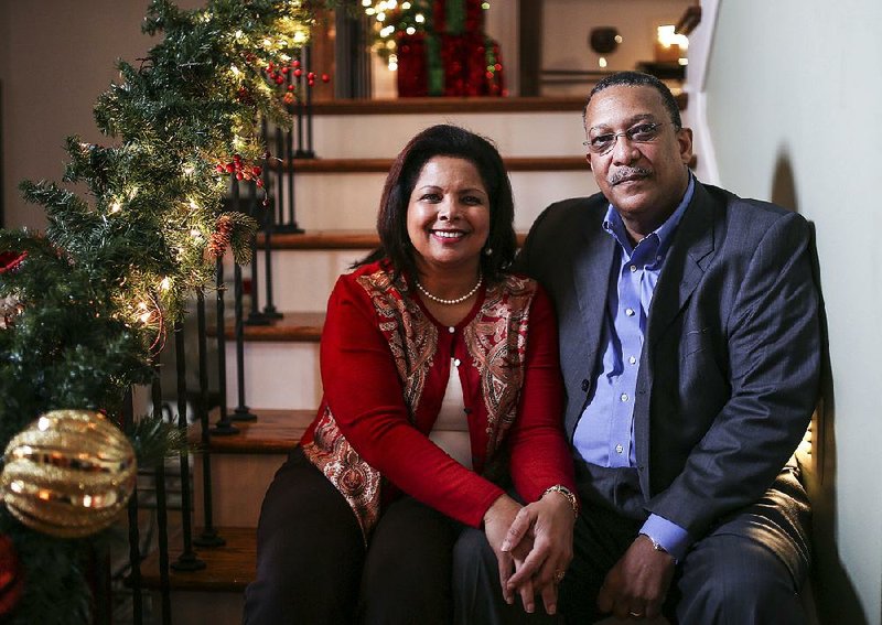 Yasmine and Ron Mathieu sit at their Little Rock home on Thursday. Yasmine says their kidney-transplant journey this year has changed them.