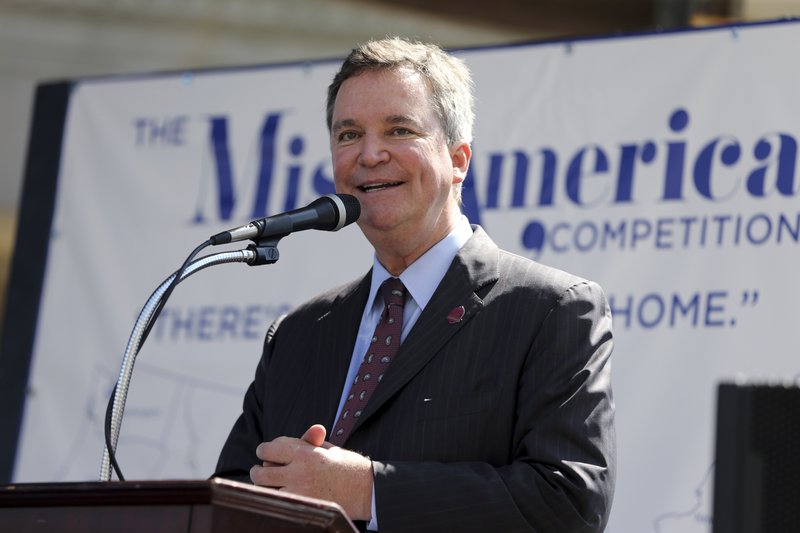 FILE- In this Aug. 30, 2016, file photo, Sam Haskell, left, CEO of Miss America Organization, speaks during Miss America Pageant arrival ceremonies in Atlantic City, N.J. On Thursday Dec. 21, 2017, the Huffington Post published emails it obtained that show Haskell and others from the Miss America Organization commenting harshly on past winners' appearance, intellect and sex lives. Dick Clark Productions, the pageant's TV production partner, severed ties with the Miss America Organization over the emails, which it termed "appalling." (AP Photo/Mel Evans, File)

