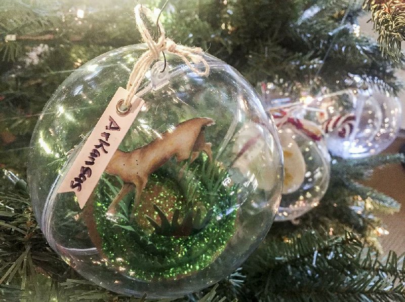 This ornament designed by Anna Bishop of El Dorado hangs on a tree at the White House visitors center.