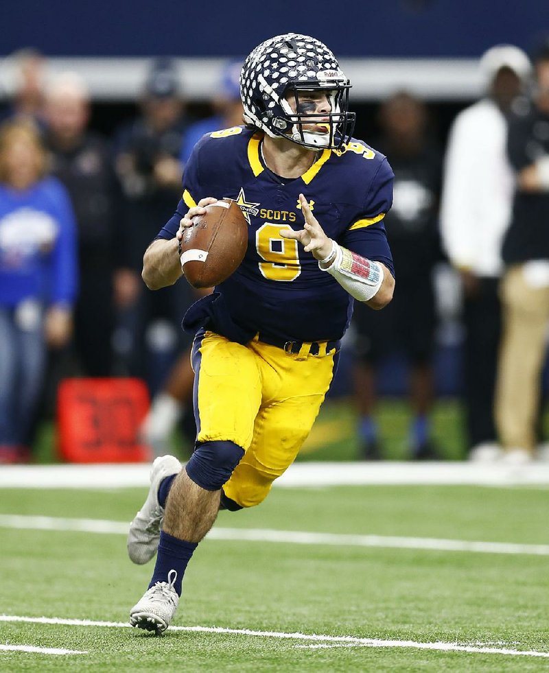 Highland Park quarterback John Stephen Jones (9) threw for more than 500 yards and led Highland Park to a
come-from-behind victory over Manvel in the Texas Class 5A Division I state championship game Friday night.