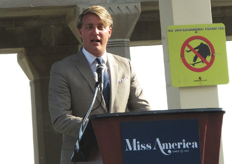 This Aug. 30, 2017 photo shows Josh Randle, president of the Miss America Organization, speaking at a welcoming ceremony for pageant contestants in Atlantic City N.J. On Saturday Dec. 23, 2017, Randle resigned from the organization in the wake of an email scandal in which top leaders of the group ridiculed former Miss Americas, including comments about their appearance, intellect and sex lives. The group's CEO was suspended on Friday. 