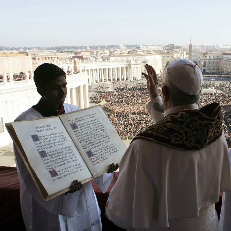 Pope Francis delivers his annual Christmas blessing Monday from the balcony of St. Peter’s Basilica at the Vatican.