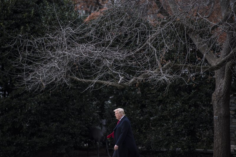 President Donald Trump crosses the White House's South Lawn on Friday to leave for the holidays. 