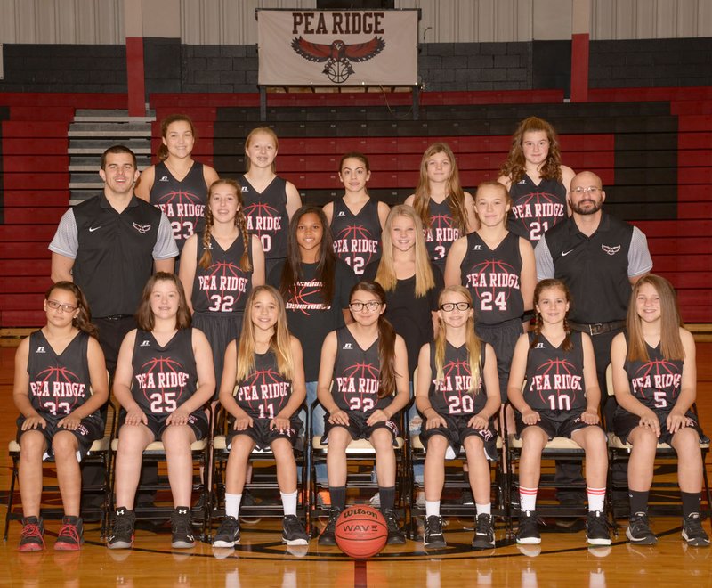 Photograph by LifeTouch Seventh-grade Lady Blackhawks are Emily Bensen, Raegan Blything, Kylie Emberson, Alexis Evanson, Meghan Gaston, Evelyn Hernandez, Reilly Ingram, Stella Kiesel, Madison McDonald, Maddie Peterson, Sydney Spears, Jadyn Spivey and Megan Wiggins. They are coached by Rudy Sanchez and assistant coaches Heath Neal and Reed Smith.
