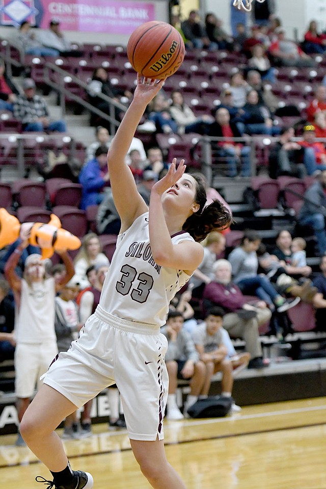Bud Sullins/Special to the Herald-Leader Siloam Springs senior Hadlee Hollenback drives to basket during the Lady Panthers' game against Stilwell, Okla., on Dec. 15. Hollenback and Siloam Springs host Claremore, Okla., at 7 p.m. Thursday in the opening round of the Siloam Springs Holiday Classic.