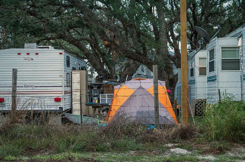 People displaced by Hurricane Harvey take shelter in tents and trailers at the the Rockport Relief Camp in Rockport, Texas, in mid-December. 