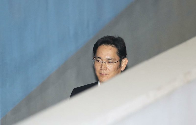 Lee Jae-yong, vice chairman of Samsung Electronics, arrives at court Wednesday in Seoul, South Korea. 
