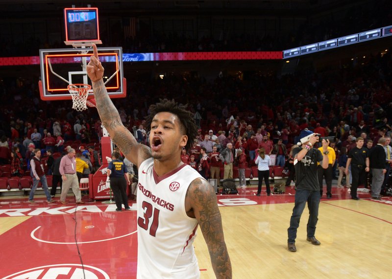 Arkansas guard Anton Beard celebrates the Razorbacks' 95-79 win over Minnesota Saturday, Dec. 9, 2017, in Bud Walton Arena.