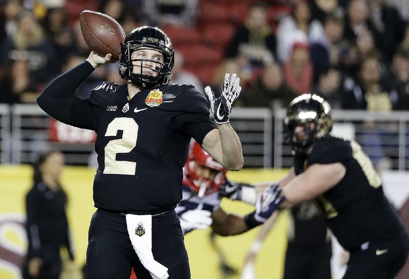 Purdue quarterback Elijah Sindelar threw for nine touchdowns and 784 yards in the Boilermakers’ last three games despite playing on a knee that required surgery for a torn ACL.