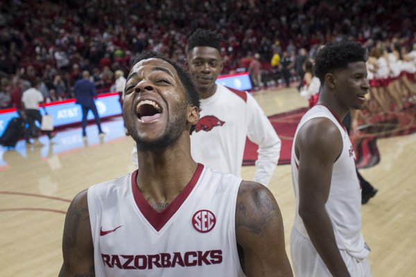 Arkansas guard Daryl Macon celebrates following the Razorbacks' 95-93 overtime win over Tennessee on Saturday, Dec. 30, 2017, in Fayetteville. 