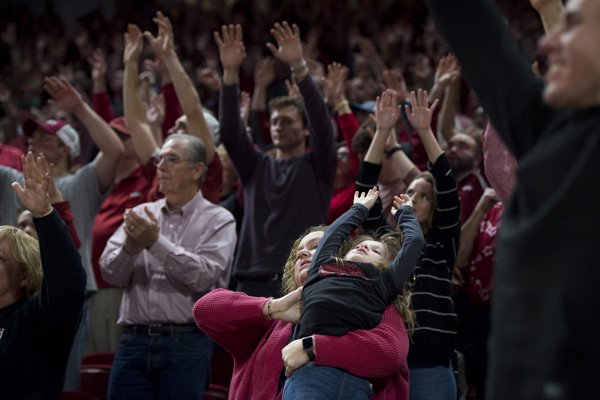 Fans call the Hogs during a game between Arkansas and Tennessee on Saturday, Dec. 30, 2017, in Fayetteville. 