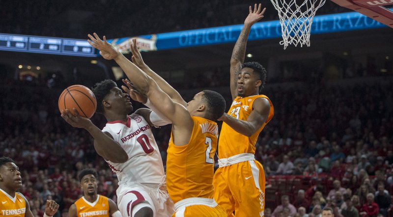 Arkansas Razorbacks guard Jaylen Barford (0) drives the ball for a layup during a basketball game on Saturday, December 30, 2017 at Walton Arena in Fayetteville.