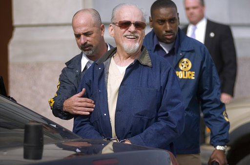 FILE - In this Nov. 13, 2009 Tony Alamo answers questions from reporters outside the courthouse in downtown Texarkana, Ark. (Evan Lewis/The Texarkana Gazette via AP, File)