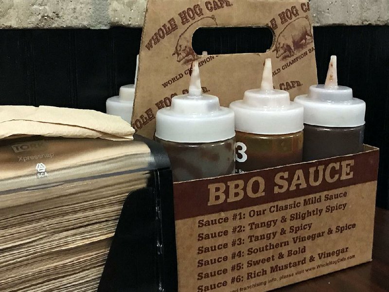 Whole Hog Cafe offers six barbecue sauces at its area outlets. 