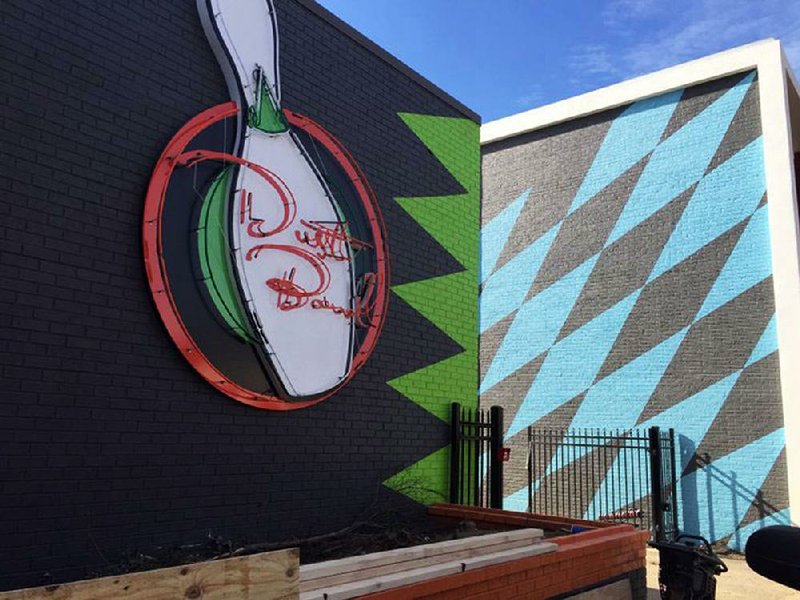 Dust Bowl Lanes & Lounge opened Tuesday on East Capitol Avenue, across from Little Rock’s transit center.
