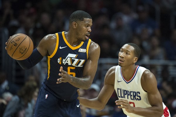 Utah Jazz guard Joe Johnson, left, and Los Angeles Clippers forward Wesley Johnson during the second half of an NBA basketball game Tuesday, Oct. 24, 2017, in Los Angeles. (AP Photo/Kyusung Gong)

