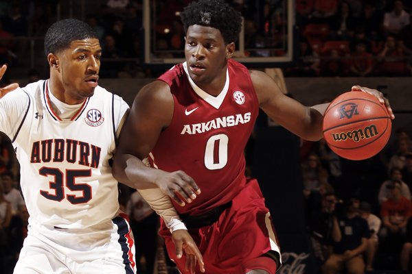 Arkansas guard Jaylen Barford (0) drives against Auburn guard Ronnie Johnson (35) during the first half of an NCAA college basketball game Saturday, Feb. 25, 2017, in Auburn, Ala. (AP Photo/Todd J. Van Emst)

