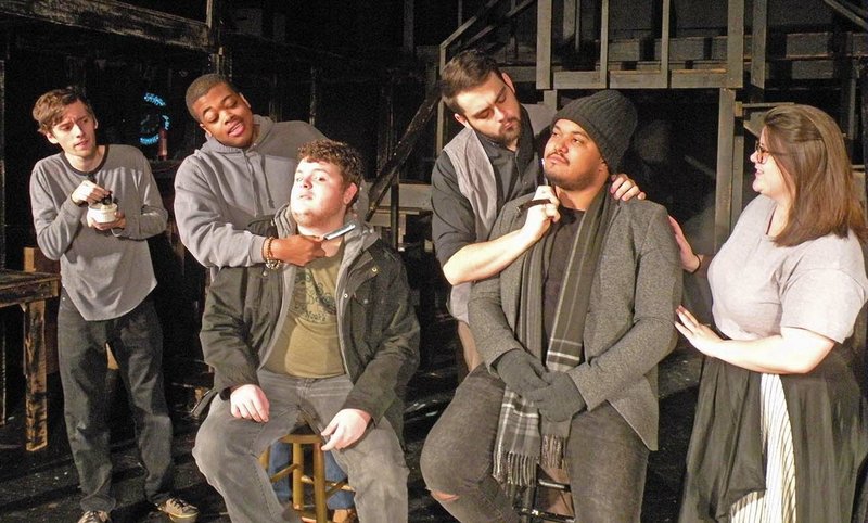 The Young Players Second Stage will present Sweeney Todd: The Demon Barber of Fleet Street through Jan. 14 at The Royal Theatre in Benton. Rehearsing a scene featuring a shaving contest are Ethan Patterson, standing, from left, who appears as Tobias Ragg; Braxton Johnson as Adolfo Pirelli; Koty Mansfield as Sweeney Todd; and Georgeann Burbank as Mrs. Lovett; and seated, Matt Glover, left, and Christian Waldron, who are members of the ensemble.