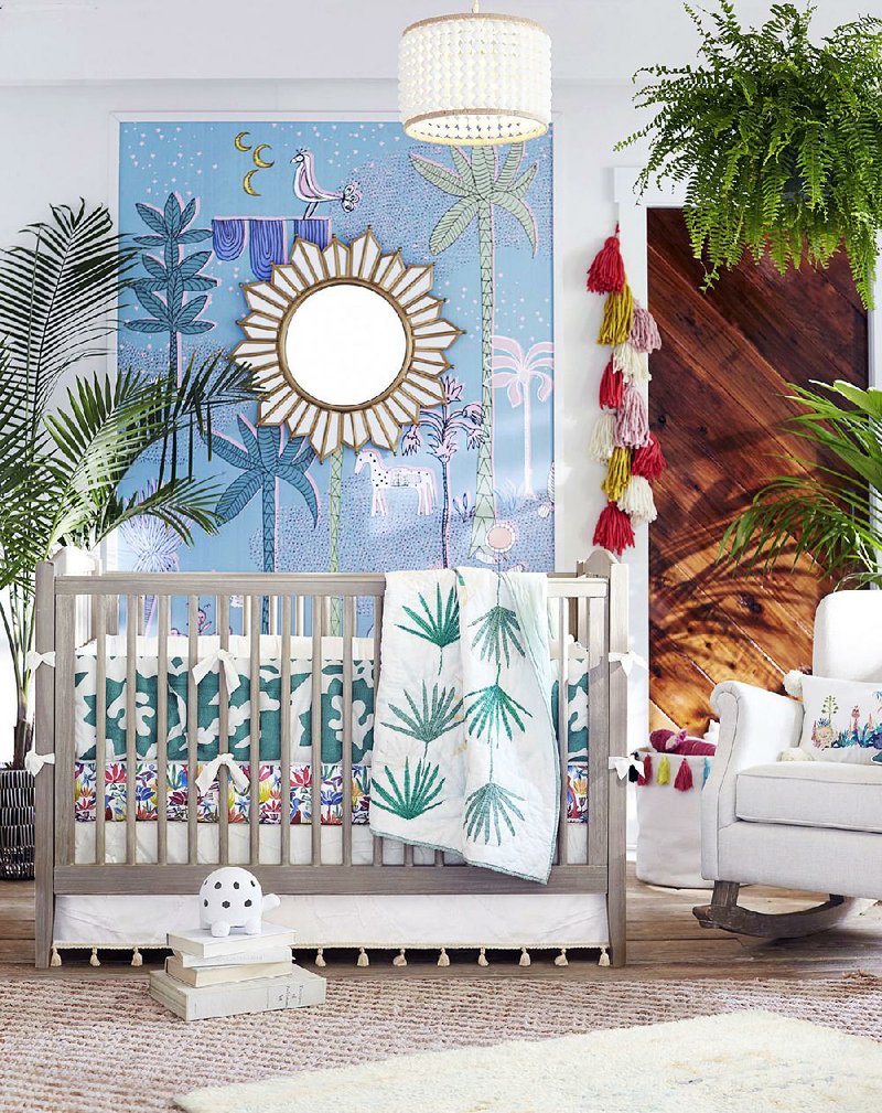 A nursery decorated with items that are part of a new collection for Pottery Barn Kids, by designer and author Justina Blakeney shows her imaginative, eclectic and playful style. Bold colors and hand drawn patterns are part of Blakeney’s signature bohemian style, inspired by her travels and love of nature.