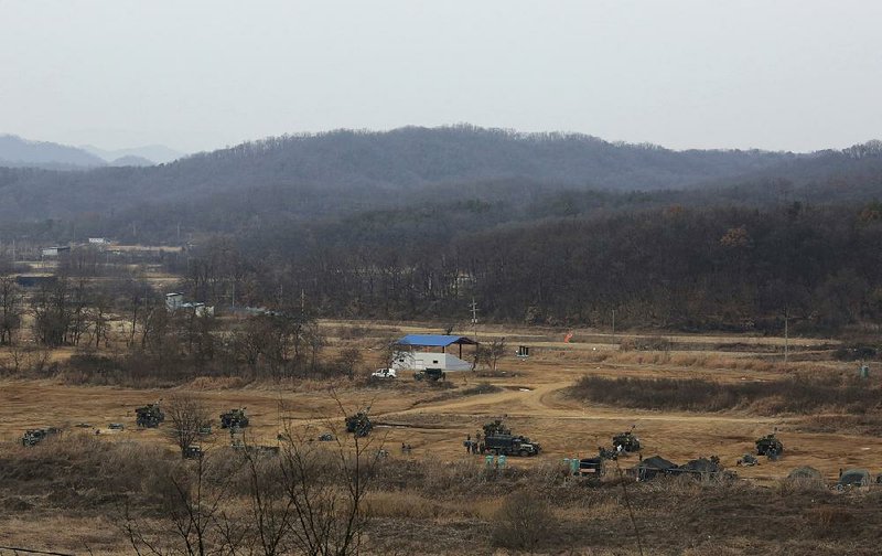 South Korean armored vehicles maneuver Thursday near the North Korean border. Large-scale exercises with U.S. forces planned for early this year are being postponed “in the spirit of the Olympic Games” set to begin Feb. 9 in South Korea, a Pentagon spokesman said Thursday.