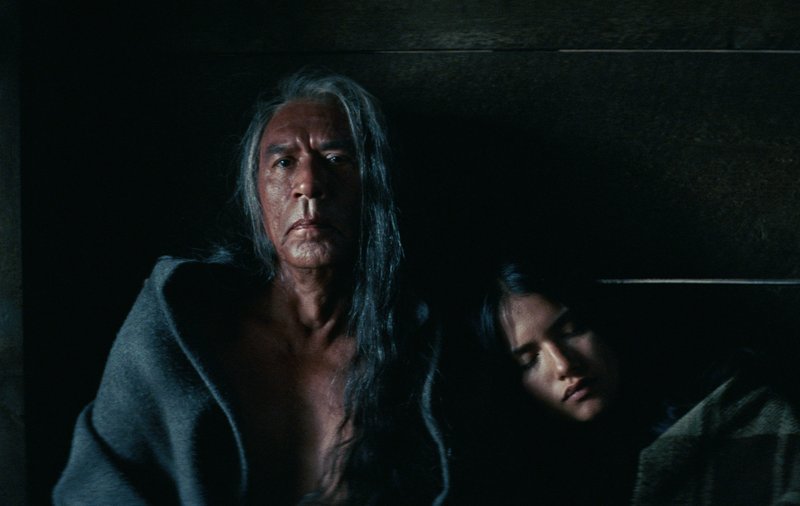 This image released by Entertainment Studios Motion Pictures shows Wes Studi, left, and Q'orianka Kilcher in a scene from "Hostiles." (Entertainment Studios Motion Pictures via AP)