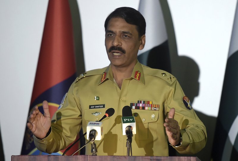 FILE - In this Monday, April 17, 2017, file photo, Pakistan's army spokesman Maj. Gen. Asif Ghafoor addresses a news conference in Rawalpindi, Pakistan. Ghafoor told that Pakistan wants to continue cooperation with the U.S. but will not &quot;compromise on national interests and prestige.&quot; (AP Photo/Anjum Naveed)