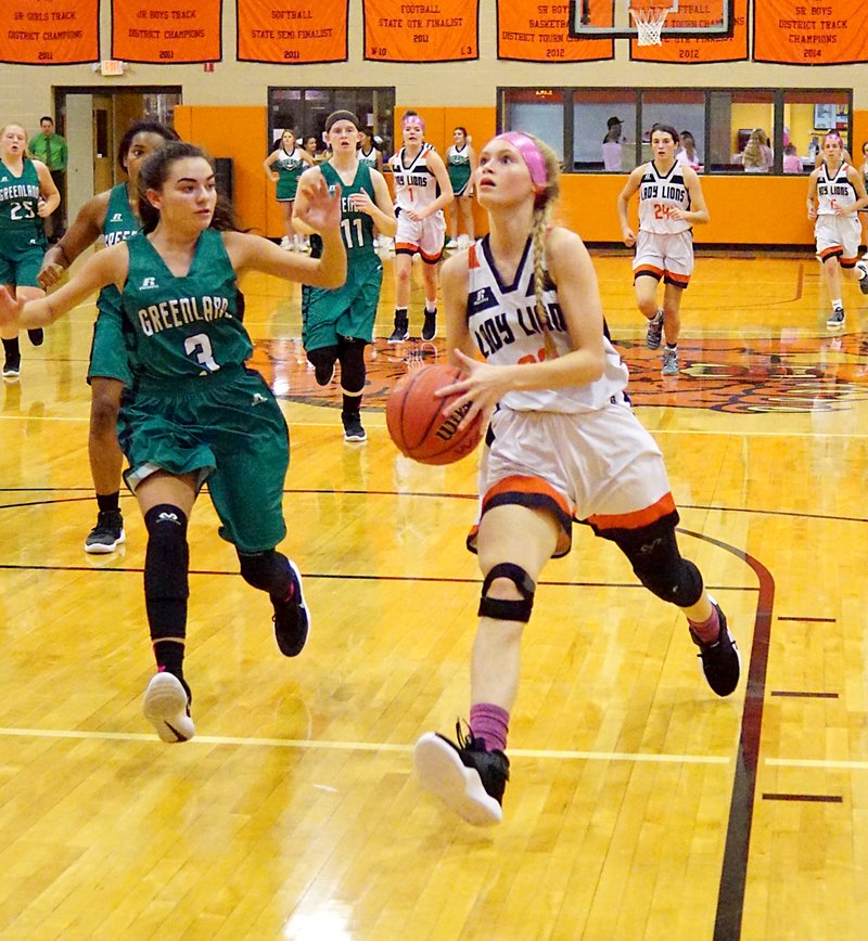 Basketball Gravette's Bookout continues working for her shot The
