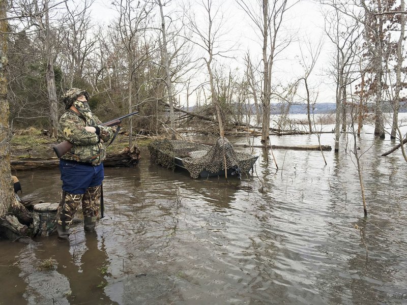 Alan Bland of Rogers hunts ducks at Beaver Lake last season, years after an unusual "quicksand" incident.