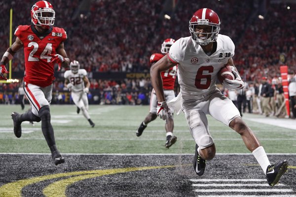 Alabama wide receiver DeVonta Smith (6) scores the game winning touchdown in overtime during the College Football Playoff National Championship game between Georgia and Alabama on Monday, Jan. 8, 2017 in Atlanta, Ga. (AJ Reynolds/Athens Banner-Herald via AP)

