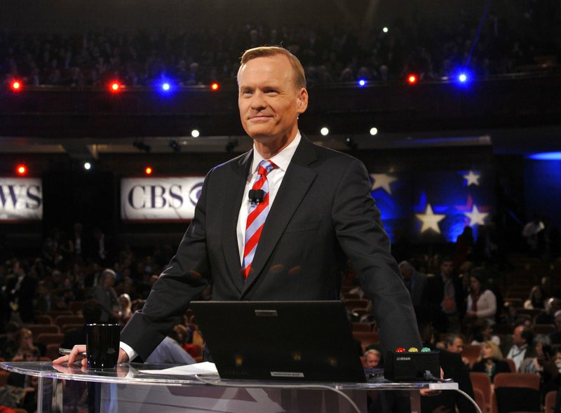 In this Feb. 13, 2016, photo released by CBS, "Face the Nation" host John Dickerson moderates the CBS News Republican Presidential Debate in Greenville, S.C. 