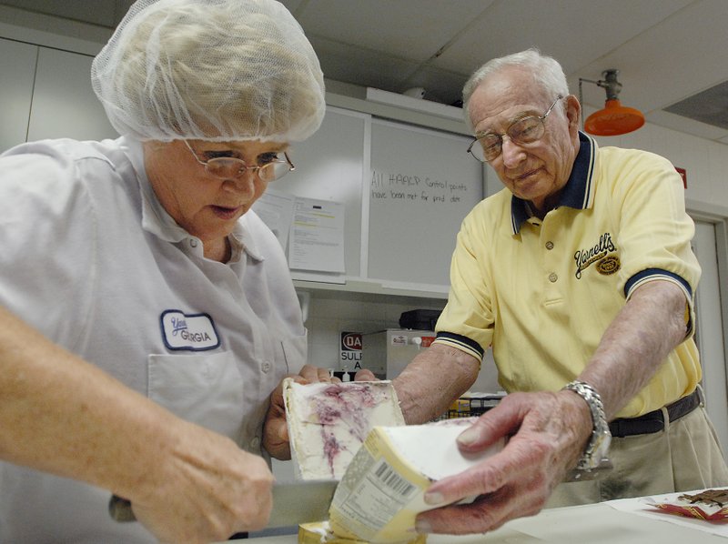 FILE — Yarnell's Chairman Albert Yarnell helps Georgia Vest cut a container of ice cream for a quality and taste test at Yarnell's Factory in this 2007 file photo.
