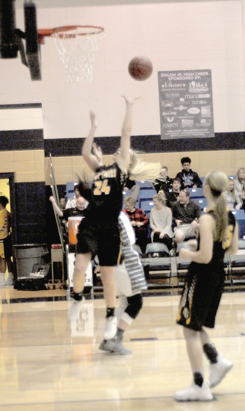 MARK HUMPHREY ENTERPRISE-LEADER Prairie Grove senior Sarah James Stone finishes a strong move in the paint during the Lady Tigers' 43-40 win over Shiloh Christian Tuesday, Jan. 2.