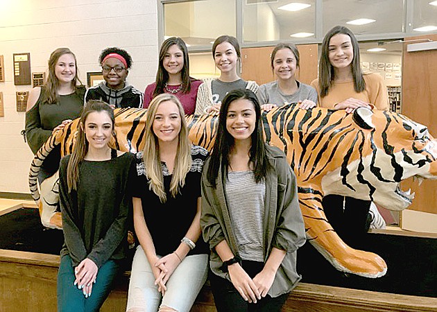 Submitted photo Prairie Grove celebrates Color's Day this week. The pep rally starts at 1:15 p.m. on Friday and the coronation ceremony will be around 6:30 Friday evening. The Tigers host Elkins Friday in basketball competition. Colors Day maids are front row (from left): senior maids Maria Luisa Akey, Glory Parrish, and Eralise Mauk. Back row: freshman maid Kelsey Pickett, sophomore maid Aniyah Gibbs, junior maids Whitney Walker and Edie Mills, sophomore maid Brenna Spradley, and freshman maid Alyssa LeDuc.