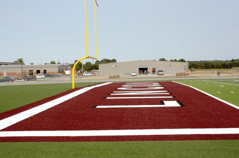MARK HUMPHREY ENTERPRISE-LEADER Lincoln's new Football Fieldhouse is located behind the high school and just east of the north end zone which is brightly colored in Lincoln's maroon and white school colors as part of the artificial turf installed at Wolfpack Stadium.