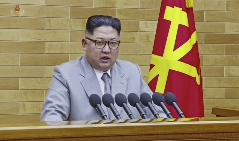 FILE - In this image made from video released by KRT on Jan. 1, 2018, North Korean leader Kim Jong Un speaks in his annual address in undisclosed location, North Korea. North Korea is starting off the new year with a fresh diplomatic initiative aimed at wooing South Korea ahead of its hosting of next month's Winter Olympics. But it's sticking to a decidedly harsh _ and familiar _ message for U.S. President Donald Trump: back off and let Koreans solve their own problems. (KRT via AP Video)