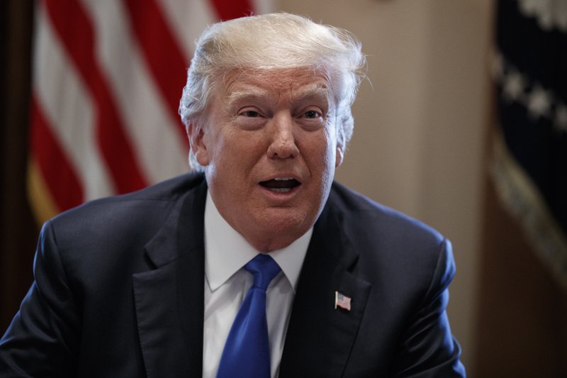 President Donald Trump speaks during a meeting with lawmakers on immigration policy in the Cabinet Room of the White House, Tuesday, Jan. 9, 2018, in Washington. Trump is getting his first medical checkup since taking office later in the week. (AP Photo/Evan Vucci)