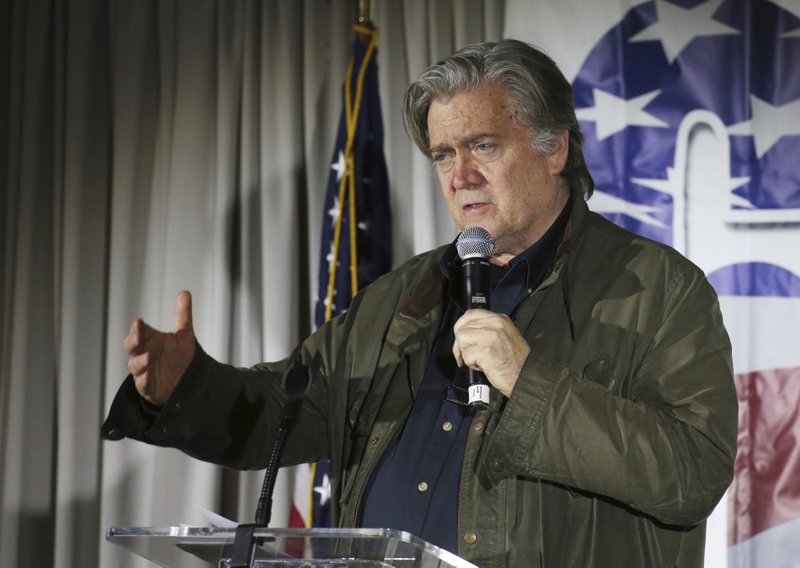 FILE - In this Nov. 9, 2017, file photo, Steve Bannon, speaks during an event in Manchester, N.H. Breitbart News Network announced Tuesday, Jan. 9, 2018, that Bannon is stepping down as chairman of the conservative news site. (AP Photo/Mary Schwalm, File)
