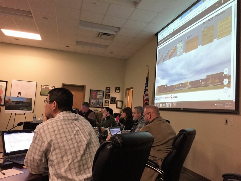 NWA Democrat-Gazette/DAVE PEROZEK The Bentonville School Board hears a presentation at its meeting Tuesday, Jan. 9, 2018, on the 12th elementary school, which is set to open in August 2019.