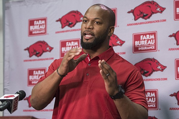 Arkansas strength and conditioning coach Trumain Carroll speaks during a news conference Wednesday, Jan. 10, 2018, in Fayetteville. Carroll is one of several former SMU staff members who have followed Razorbacks coach Chad Morris to Arkansas. 