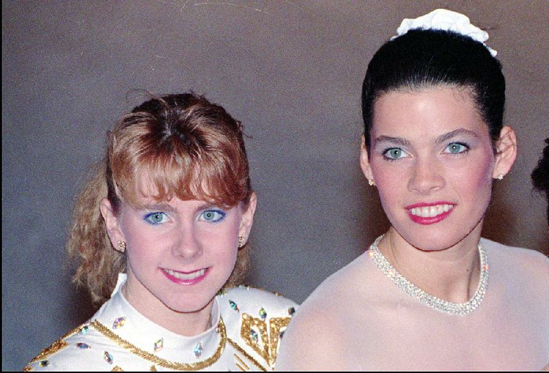 Tonya Harding, (left), and Olympic rival Nancy Kerrigan are shown in a 1992 photo. In 1994, Kerrigan would be attacked and their lives entwined forever. An ABC special on Harding airs at 8 p.m. today.
