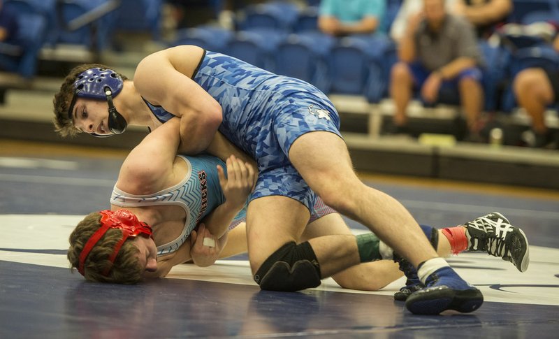 NWA Democrat-Gazette/ANTHONY REYES @NWATONYR Rogers High's Jake Turner started his season off last weekend by winning his weight class at the Butler (Mo.) Invitational. The defending Class 6A-7A state champion at 138 pounds had been sidelined by an injury.
