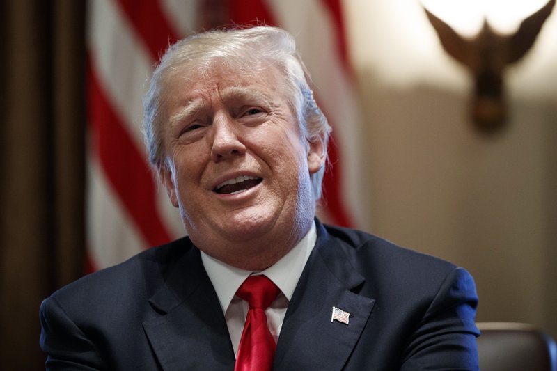 President Donald Trump speaks during a cabinet meeting at the White House, Wednesday, Jan. 10, 2018, in Washington. Trump on Thursday pushed the House to renew a critical national security program that allows spy agencies to collect intelligence on foreign targets abroad. (AP Photo/Evan Vucci)

